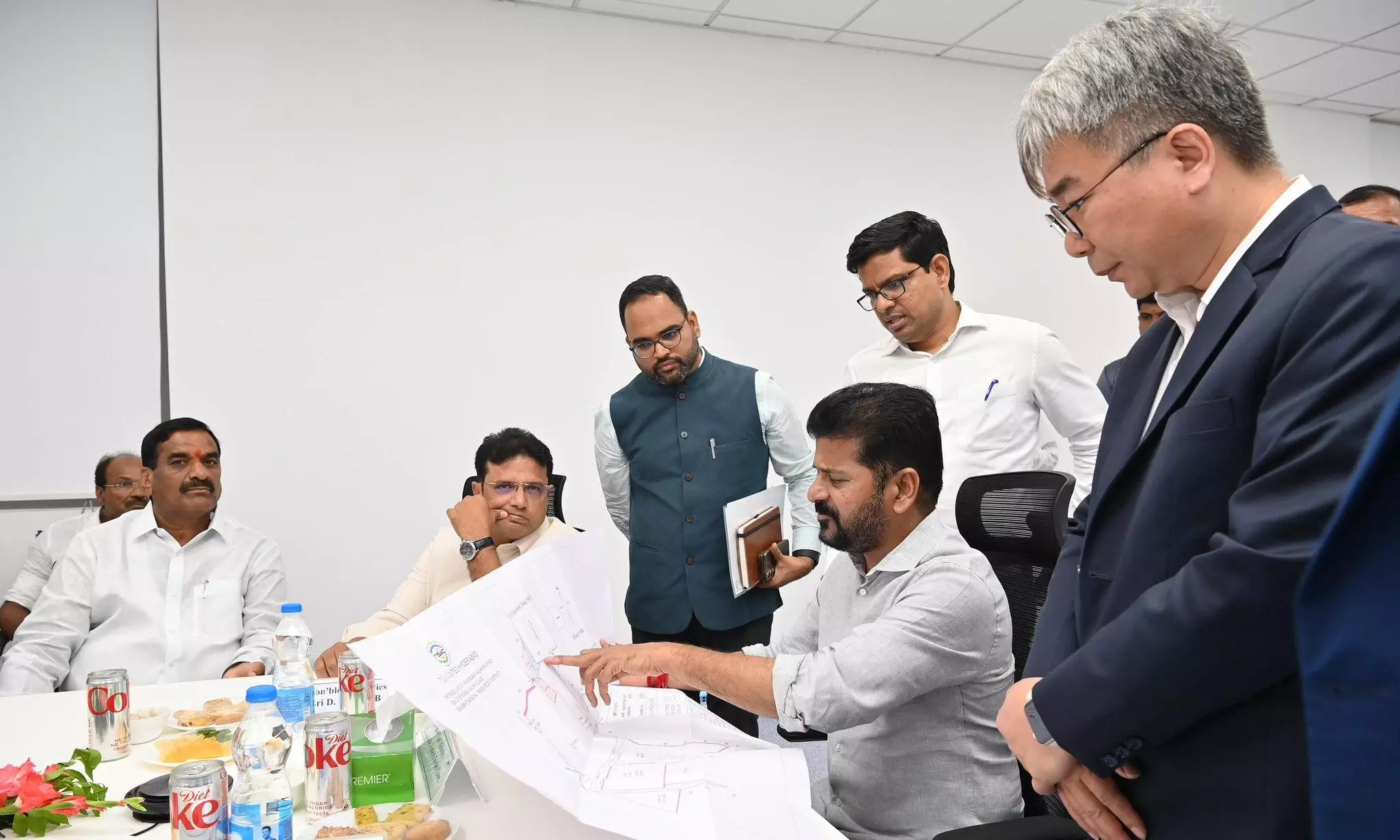 Revanth Offers 2,000 Acres Land to Woo Foxconn to Telangana Revanth Offers 2,000 Acres Land to Woo Foxconn to Telangana