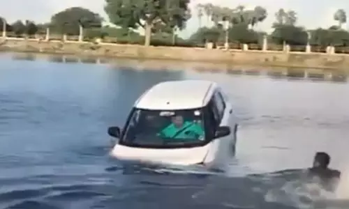 Two rescued as car plunges into water tank in Jangaon