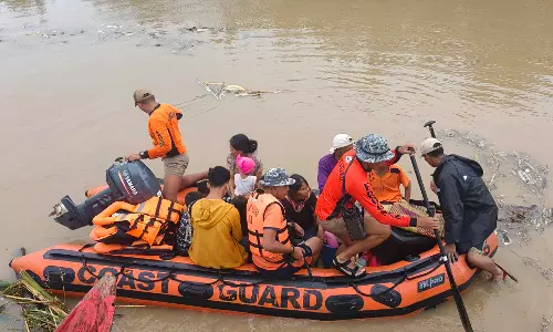 At least 24 people dead in flooding and landslides in Philippines