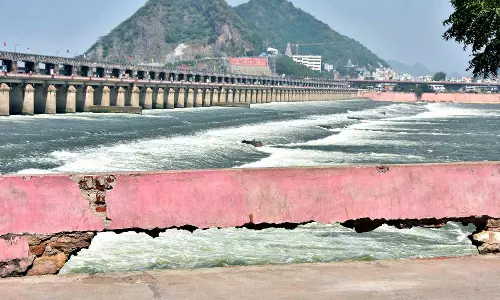 Portion of retaining wall along Krishna River on Sitanagaram side collapses