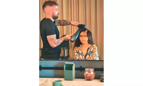 Use the hair dryer with caution