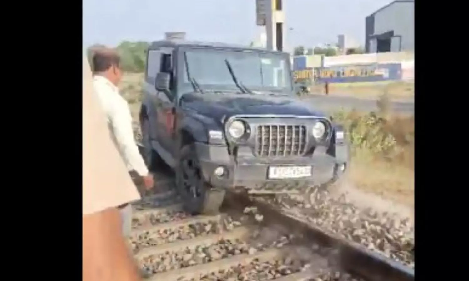 Man drives SUV on railway track for reel, video viral Man drives SUV on railway track for reel, video viral