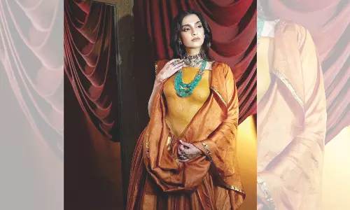 Look, no blouse, only fab artwork