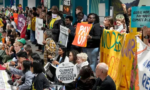 Protesters call for more money pledge