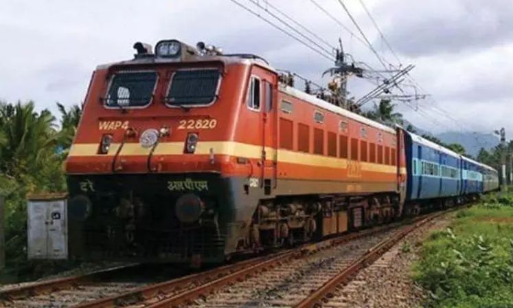 Train delay forces family to cross tracks with patient on stretcher in Jharkhand