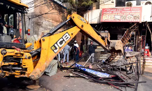 GHMC and SCB Clear Footpath Encroachments in West Marredpally
