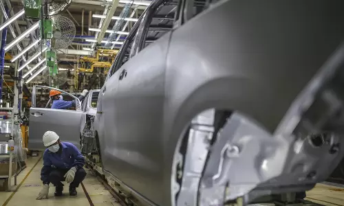 India factory growth softened in Nov on high inflationary pressures