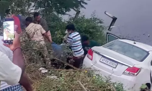 Car plunges into pond, 5 killed