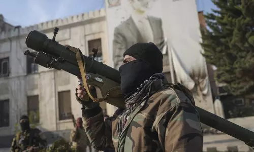 Trump says US shouldn’t intervene in Syria as opposition forces gain ground