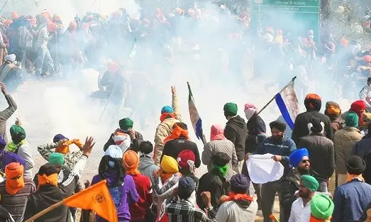 Farmers march stopped at barricades, teargas shells fired Farmers march stopped at barricades, teargas shells fired