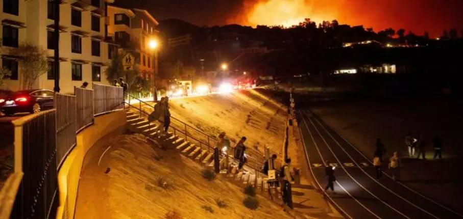 Homes burn as wind-driven wildfire prompts evacuations in Malibu, California Homes burn as wind-driven wildfire prompts evacuations in Malibu, California