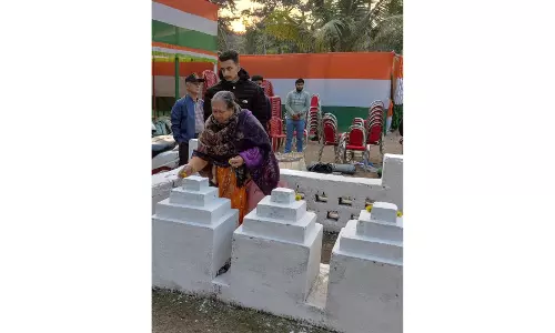 A 71 war-widows tribute to husbands memorial for first time