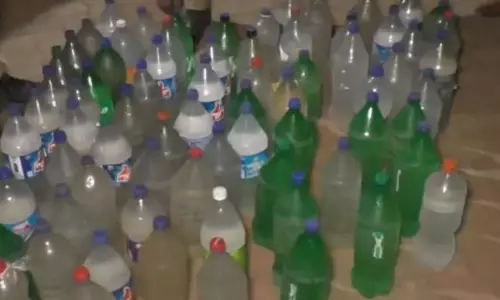 Country liquor smuggled in cold drinks bottle seized in Odisha; 3 arrested
