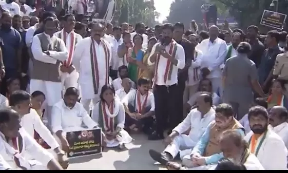 Modi trying to protect Adani: Revanth