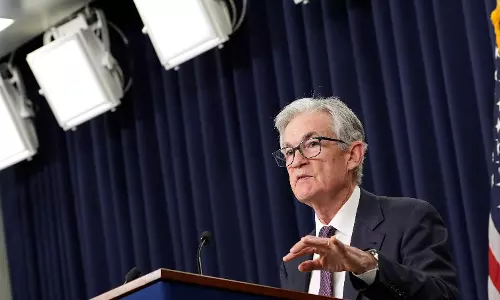 US Fed cuts key rate a quarter point and signals fewer cuts ahead