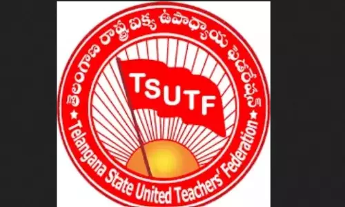 Order over photos on notice boards splits teachers union Order over photos on notice boards splits teachers union