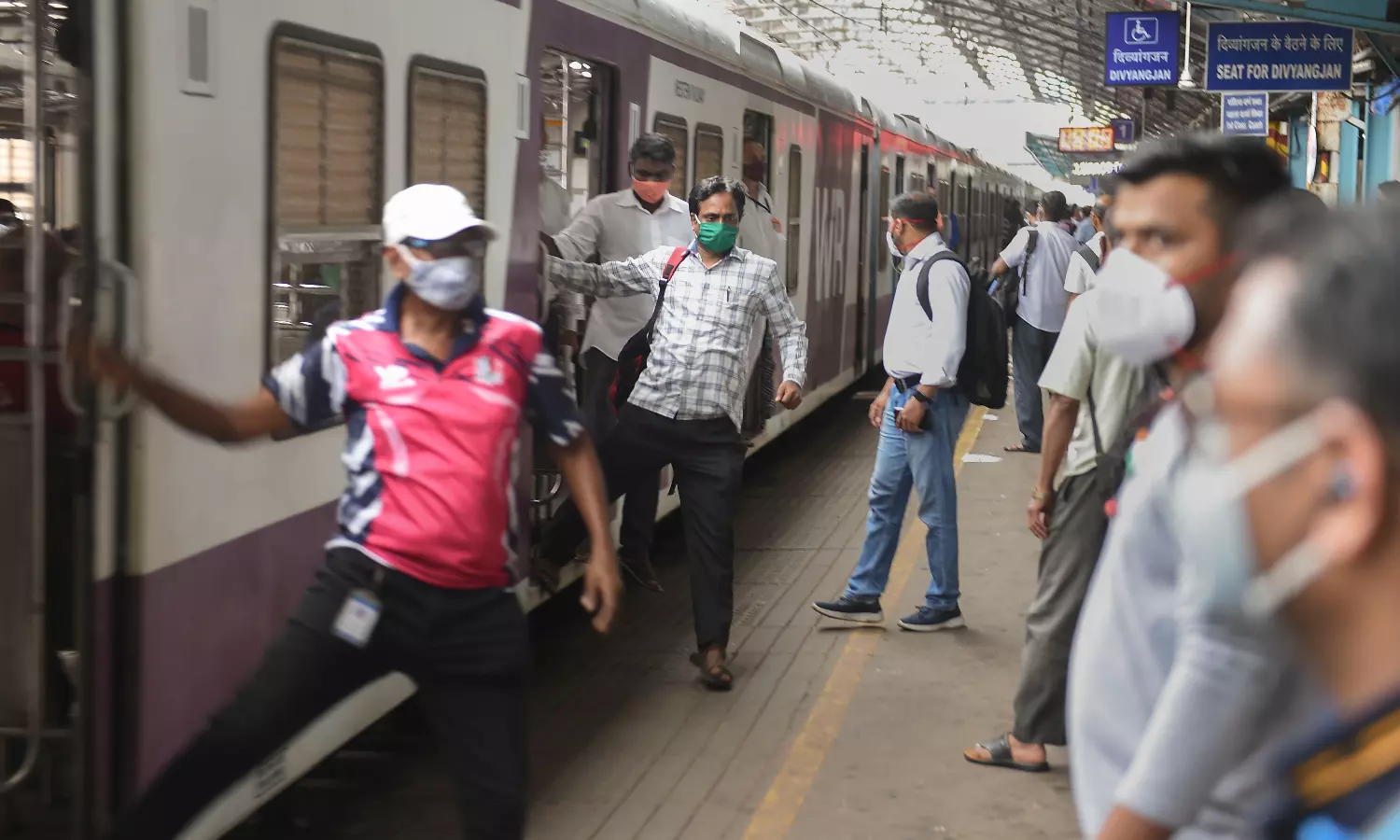 Man standing on local train footboard dies after his head hits track pole