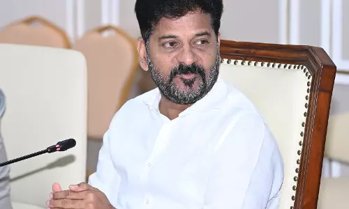 Expedite land acquisition for RRR: Revanth
