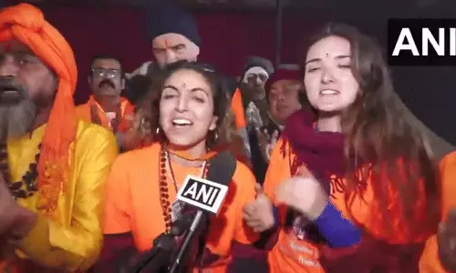 Foreign devotees flock to Triveni Sangam for first Amrit Snan of Maha Kumbh