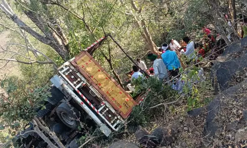 Van with 50 Adivasi devotees falls into valley at Malepur Ghat