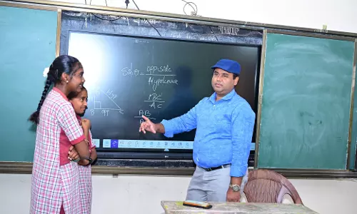 Medak collector turns teacher, teaches Trigonometry to class X students
