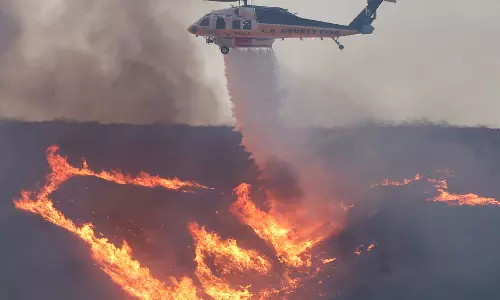 Mass evacuations after explosive new fire erupts near Los Angeles