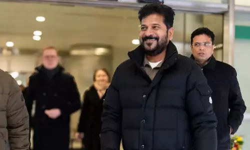 CM Revanth gets grand welcome on arrival from Davos