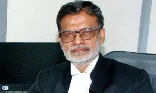 Justice Sujoy Paul Unfurls National Flag at Telangana HC