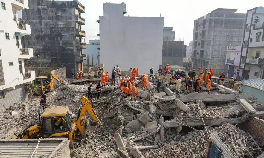 Two girls among three killed in Delhi building collapse