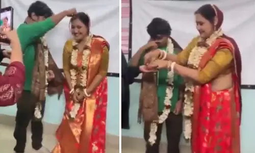 Bengal professor faces  inquiry after  marrying student in classroom