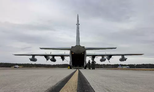 First military flight lands in Guantanamo Bay with migrants deported from the US First military flight lands in Guantanamo Bay with migrants deported from the US