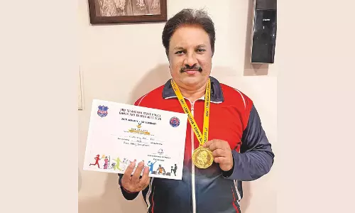 The winner lifts it all