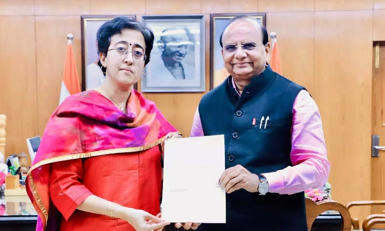 Delhi CM Atishi hands over resignation to lieutenant-governor V.K. Saxena after AAPs rout Delhi CM Atishi hands over resignation to lieutenant-governor V.K. Saxena after AAPs rout