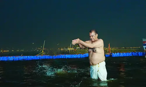 Telangana minister Venkat Reddy takes holy dip at Maha Kumbh
