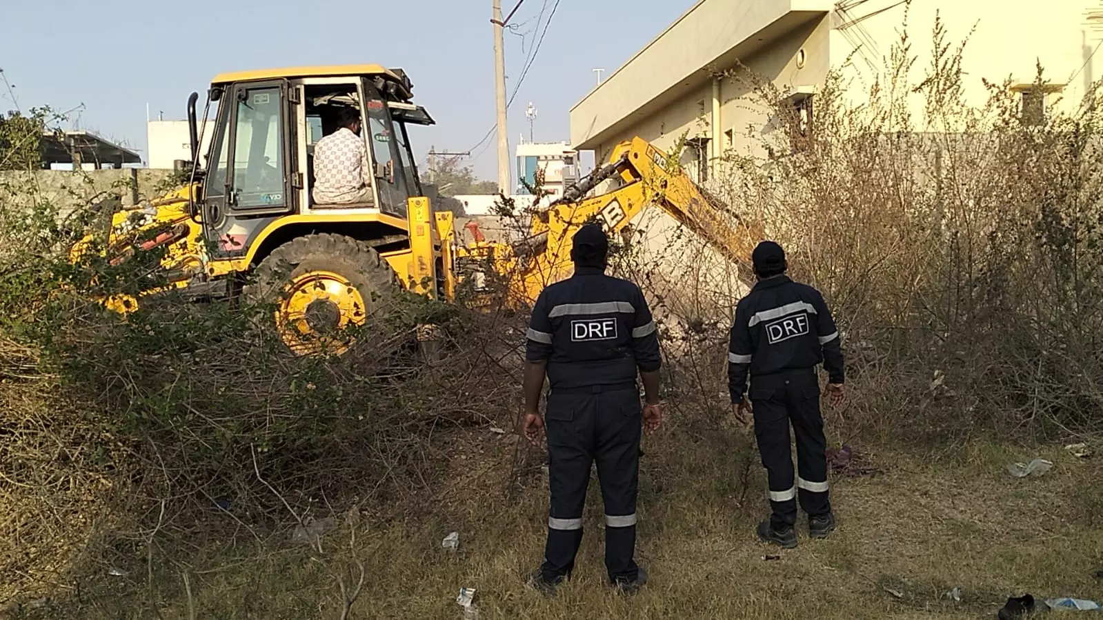 HYDRAA razes wall blocking Dalit Colony HYDRAA razes wall blocking Dalit Colony
