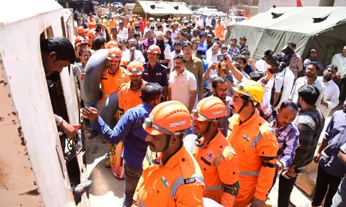Rescue efforts continue to save workers trapped in SLBC tunnel Rescue efforts continue to save workers trapped in SLBC tunnel