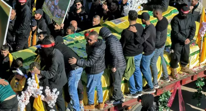 Lebanon village buries dozens of dead, after Israeli withdrawal Lebanon village buries dozens of dead, after Israeli withdrawal