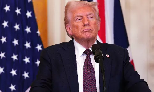 Trump says China to face added 10% tariff starting in March