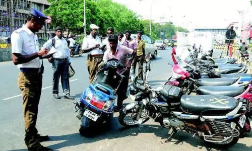 Vizag traffic cops take hard line on bike stunts Vizag traffic cops take hard line on bike stunts