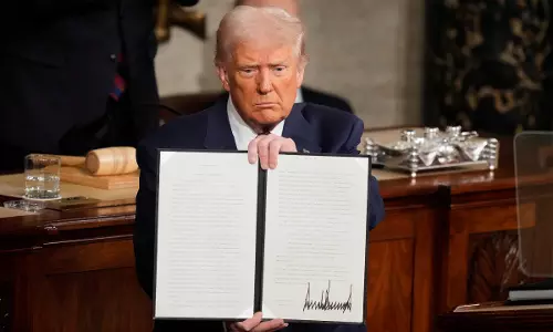 Trump grants monthlong exemption for US automakers from new tariffs on imports