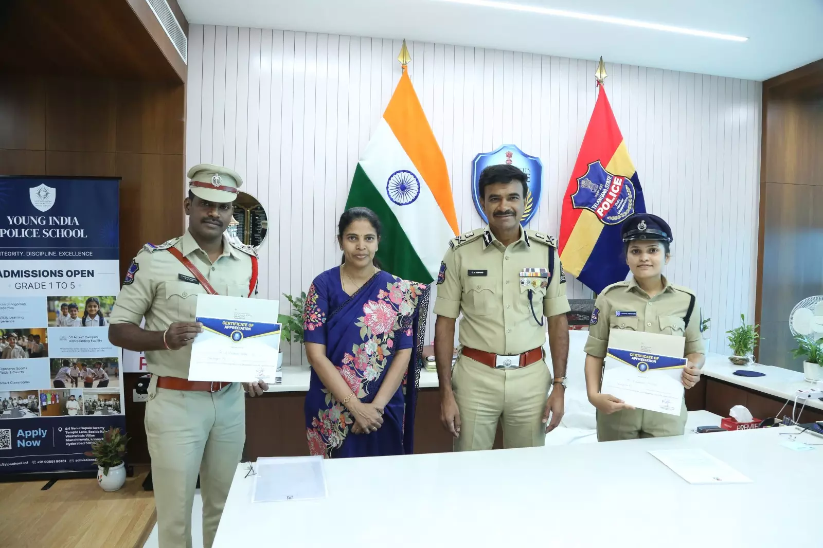 Anand pats two cops for good job Anand pats two cops for good job