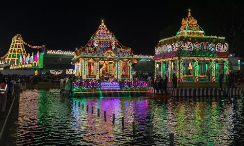 Tirumala Lord adorns Sri Krishna Avatar on 2nd day of Teppotsavam