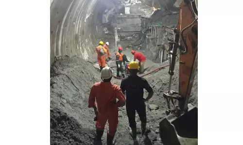 Amidst Heavy Lifting of Debris, Rescuers Swing Between Hope and Despair