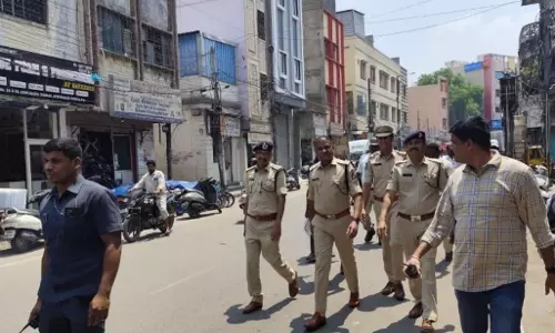 East zone officials inspect the procession route on Wednesday for the Sri Rama Navami festival on April 6