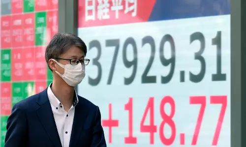 Stock market today: Asian shares sag after Trump raises tariffs on auto imports