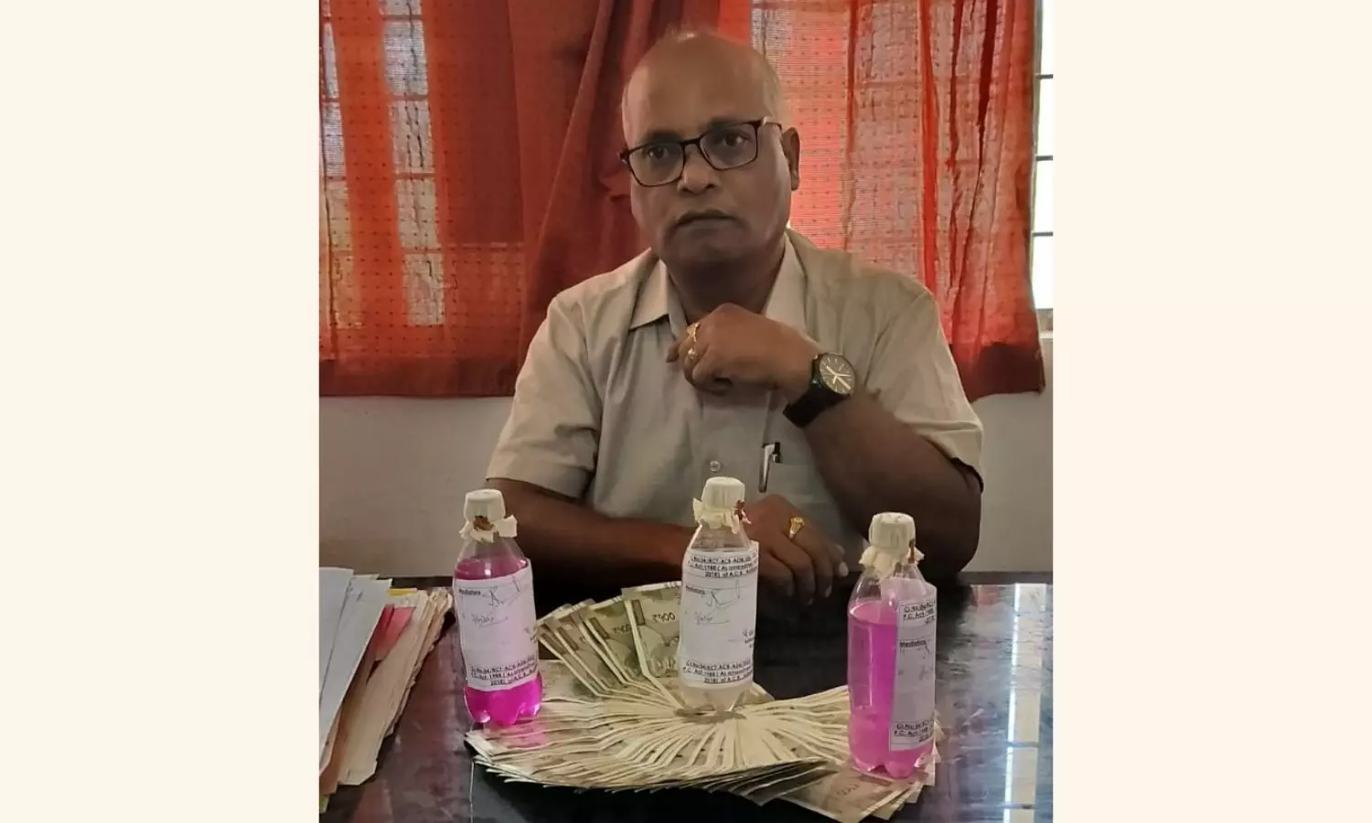Adilabad DMHO employee held in bribe case Adilabad DMHO employee held in bribe case