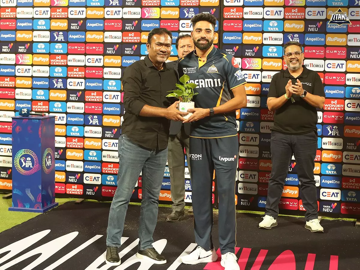 Siraj, Buttler power Gujarat Titans to eight-wicket win over RCB