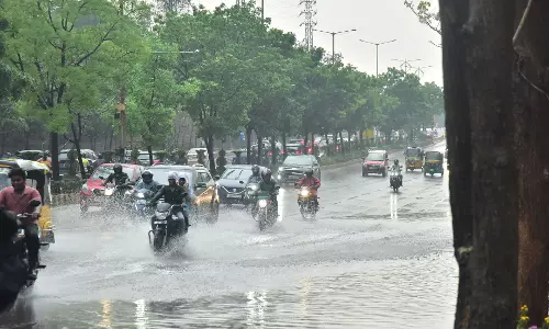 Children welcome sudden rains in Hyderabad