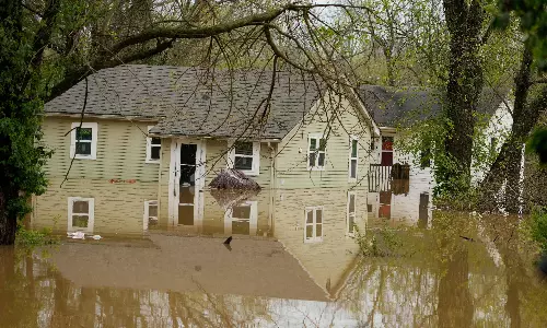 At least 16 dead in flooding, tornadoes as storms slash from Texas to Ohio