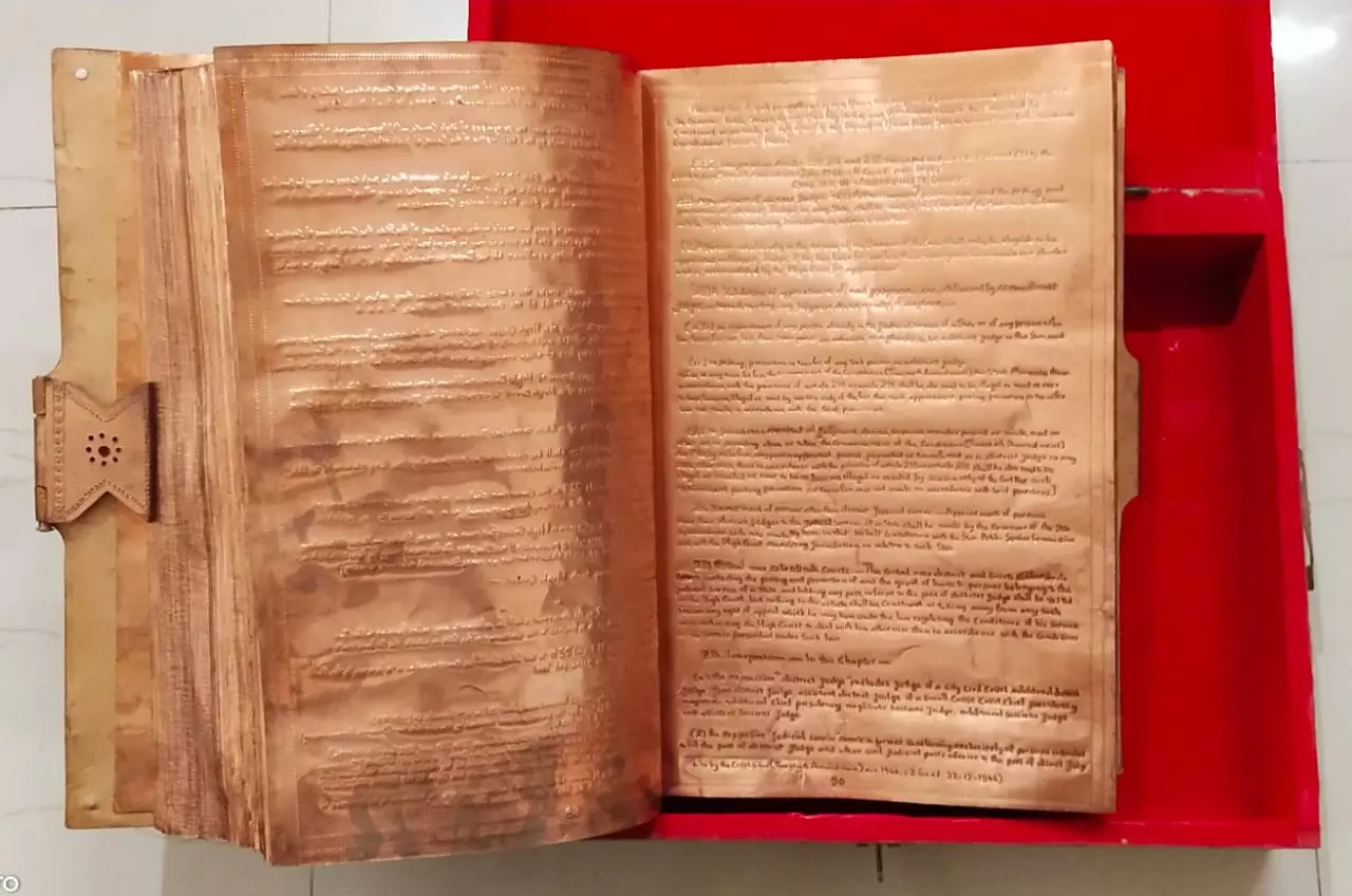 Ex-govt Officer Fetes Ambedkar with Handwritten Constitution on Metal Sheets